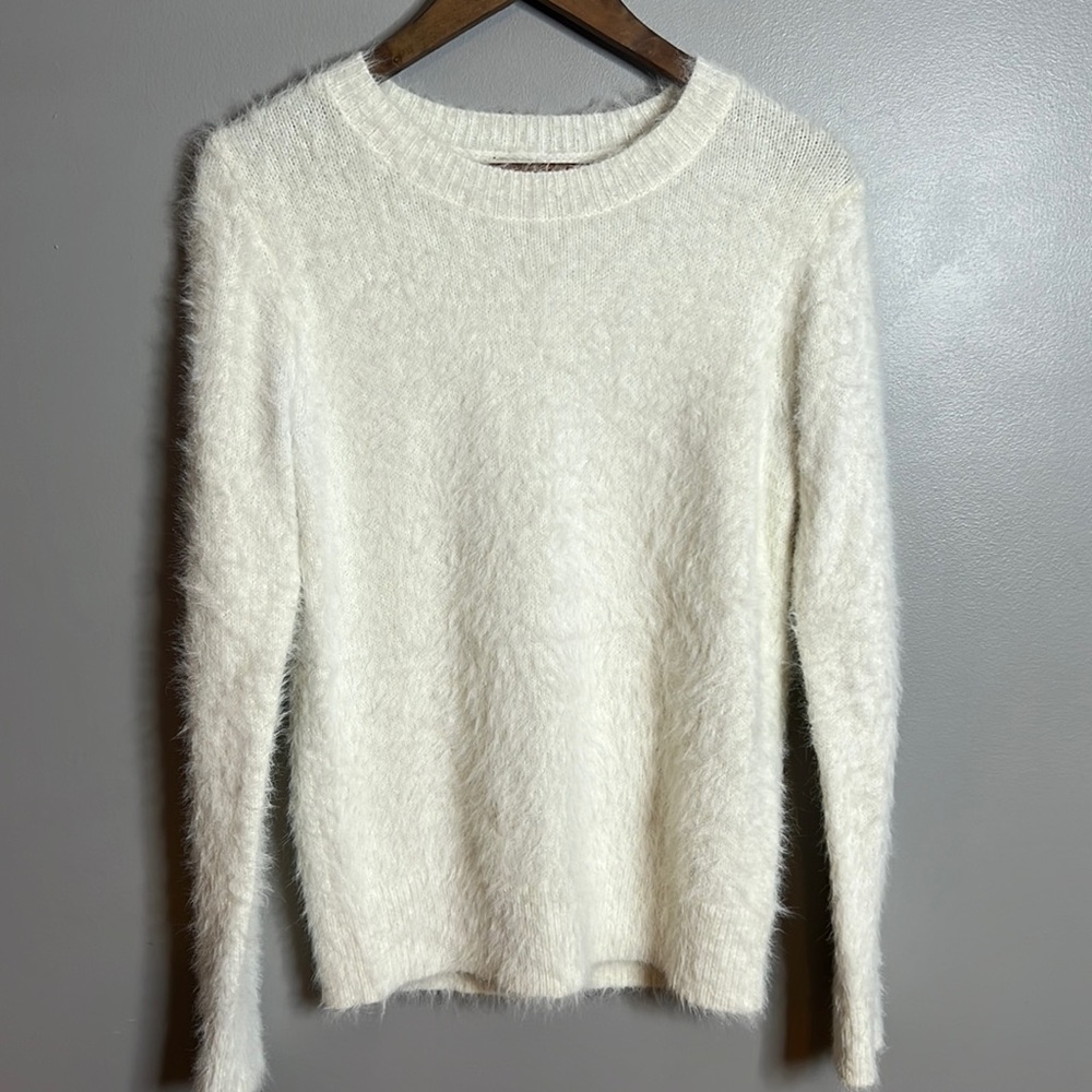 Soft and fuzzy white cream long sleeve sweater size medium by A new Day